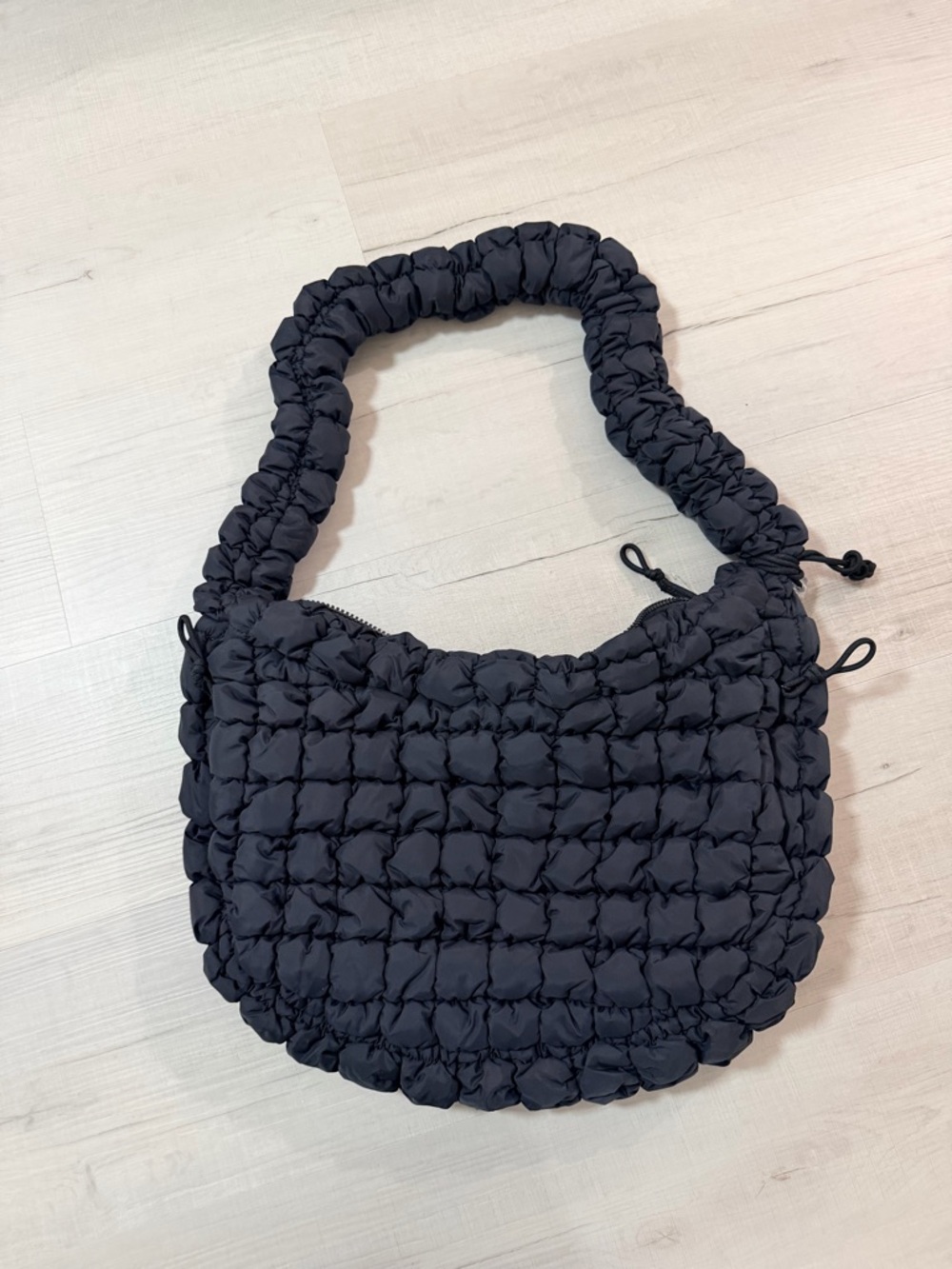 Quilted Puffy Sling Shoulder Bag in Black